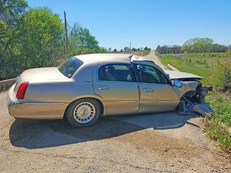 <b>The car struck a bridge railing before coming to a halt. </b>Photos courtesy Saline County Sheriff's Office