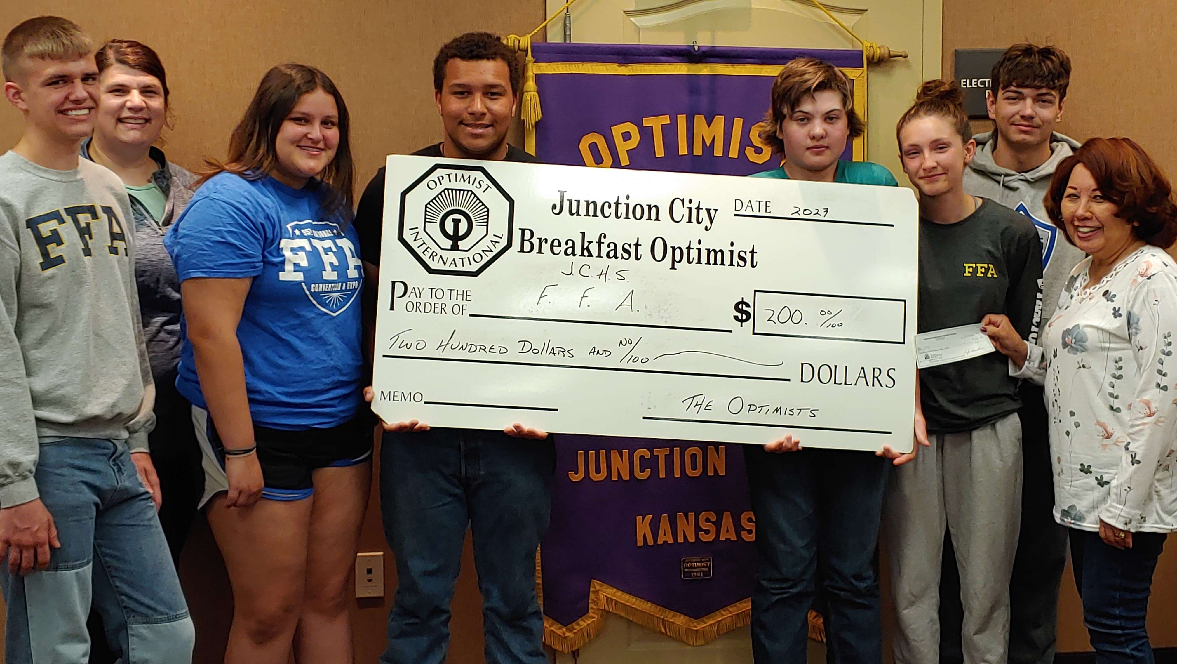 Pictured left to right: Isabel Huddleston; Leon Leadabrand; Keiondrae Wilcox; Laura Miller, FFA Instructor; Ethan Goodyear; Emma Hinds; Jamie Amerson and Nita Miller, JC Breakfast Optimist Club President.