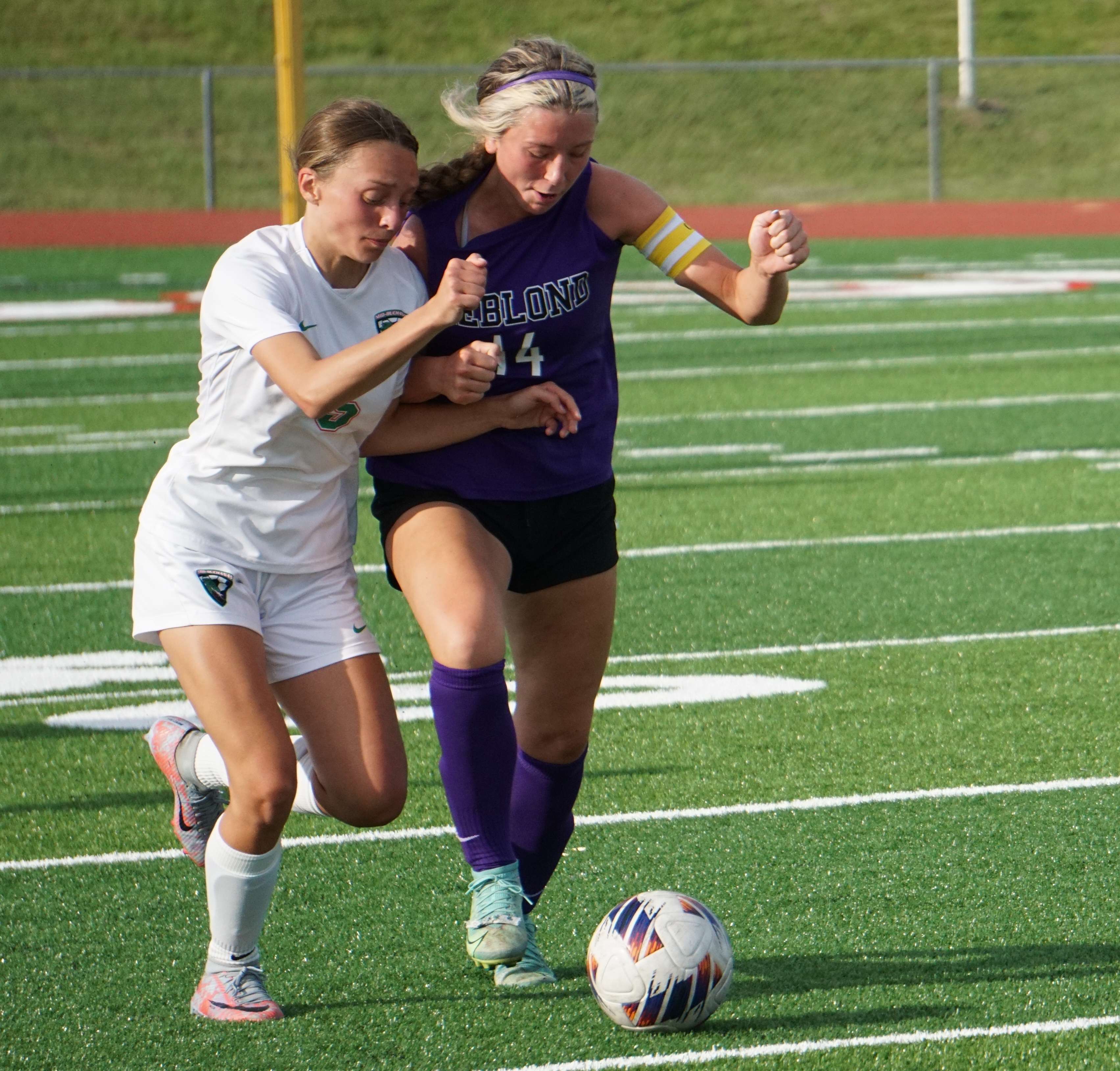 Tatum Studer (14) and London Wilson.