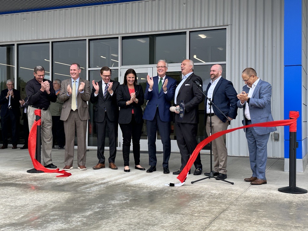 <b>Pictured starting left, Salina Mayor Mike Hoppock, U.S. Representative Tracey Mann, Lieutenant Governor/Commerce Secretary David Toland, Schwan's COO Julie Francis, U.S. Senator Jerry Moran,&nbsp;Schwan’s Company CEO Dimitrios Smyrnios, Chris Wiseman, Schwan's senior director of manufacturing, Tony Puri, executive vice president of strategic capital. </b>Photos by Nate King/Salina Post