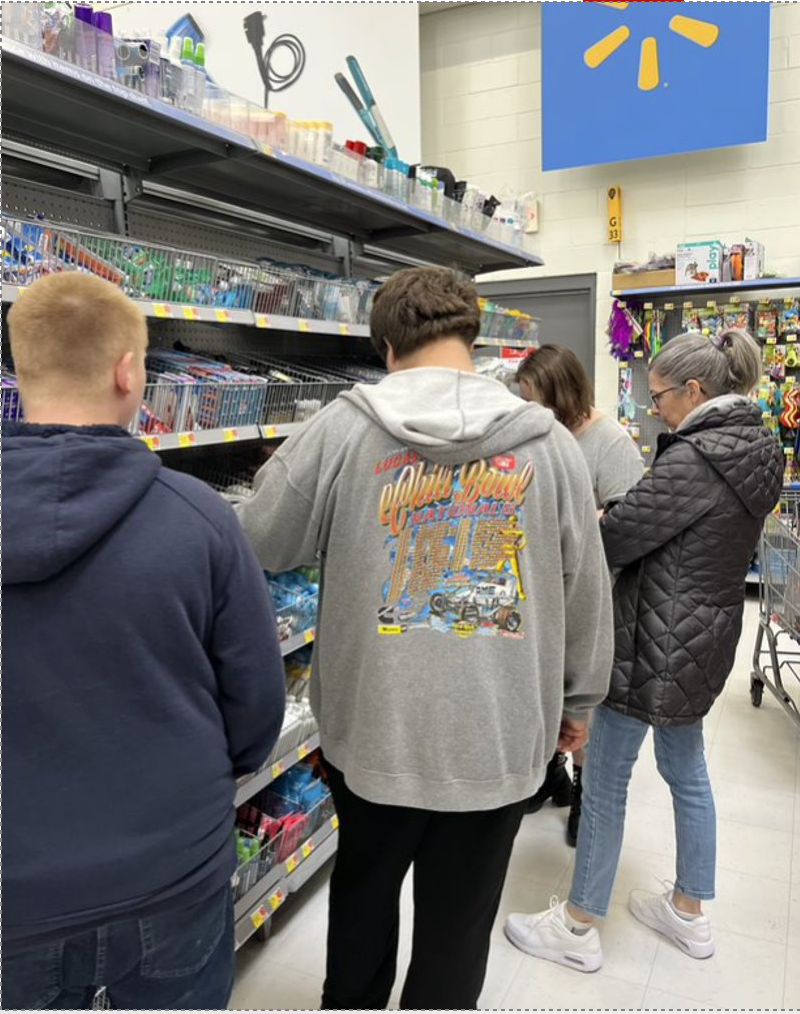 Westside School students shop for items for blessing bags for foster kids. Courtesy photo