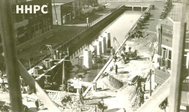 Bornholdt Feed &amp; Seed - Covering of Cow Creek on Ave. A west of Main - Dec. 15, 1928. Courtesy of the Conard-Harmon Collection.