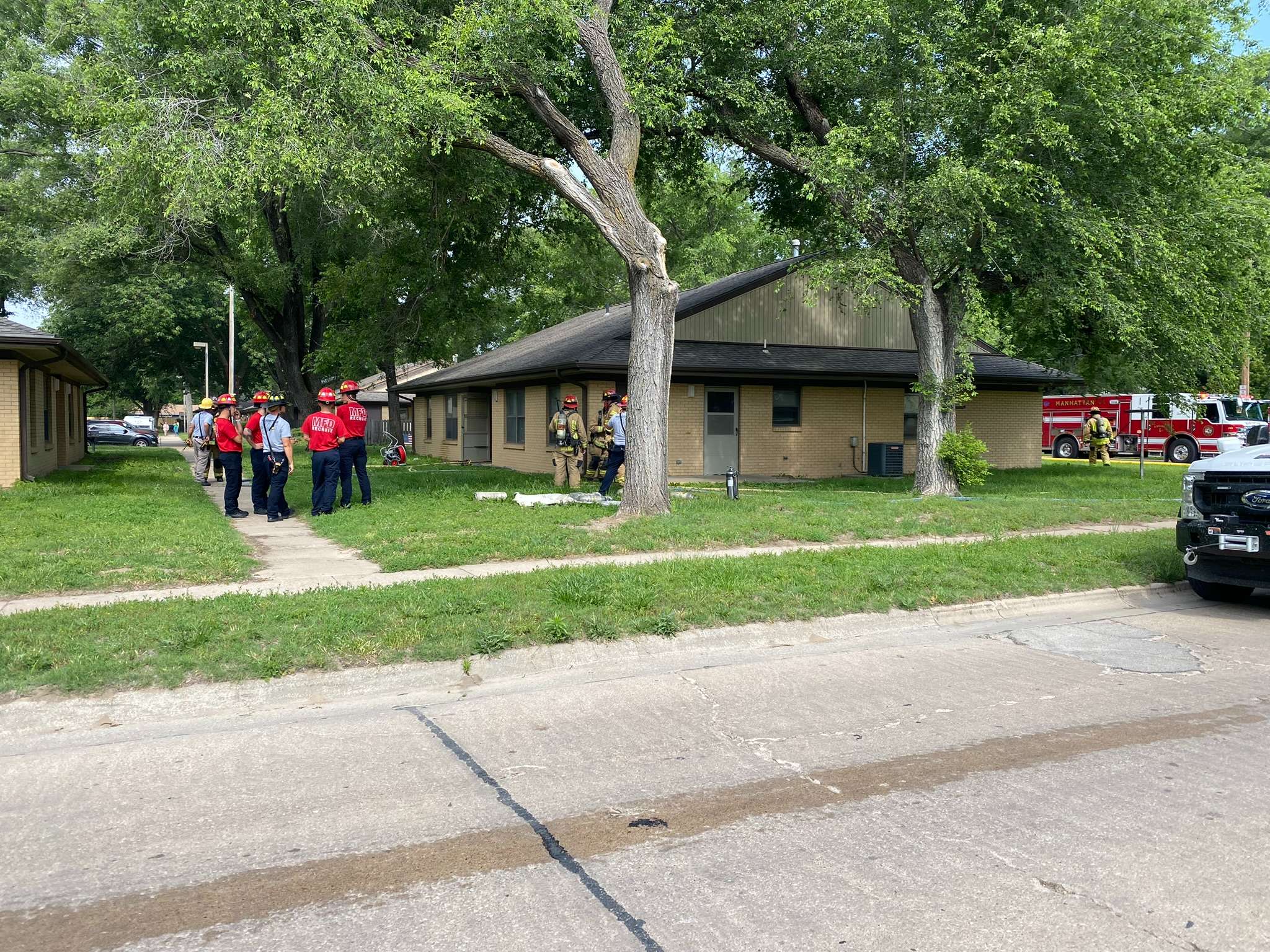 Firefighters at structure fire at 1006 Pottawatomie Ct, photo by Becky Goff