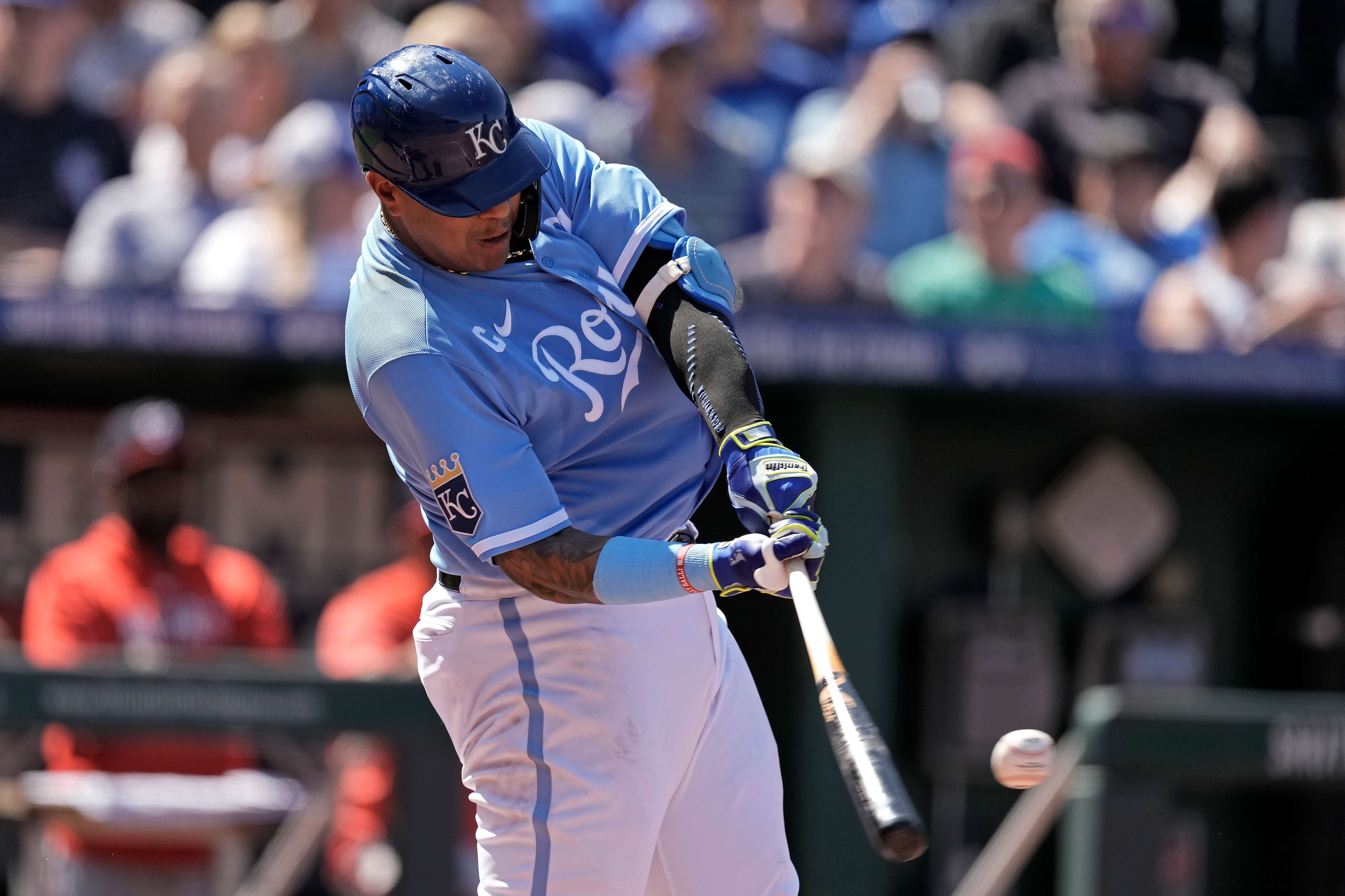 Kansas City Royals' Salvador Perez hits a solo home run during the third inning of a baseball game against the Washington Nationals Saturday, May 27, 2023, in Kansas City, Mo. (AP Photo/Charlie Riedel)