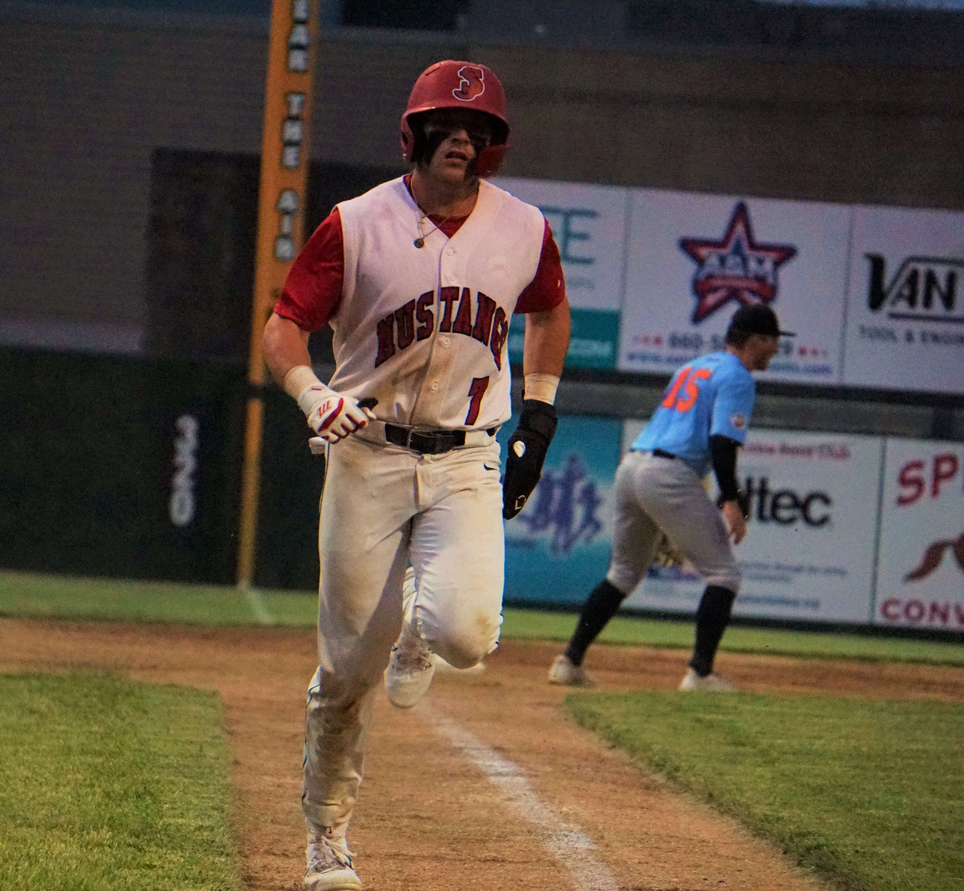 Trevor McCollum comes around to score.