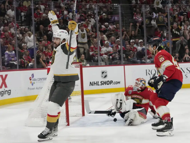 Vegas Golden Knights center Chandler Stephenson (20) celebrates after scoring a goal against Florida Panthers goaltender Sergei Bobrovsky (72) during the first period in Game 4 of the NHL hockey Stanley Cup Finals, Saturday, June 10, 2023, in Sunrise, Fla. (AP Photo/Lynne Sladky)