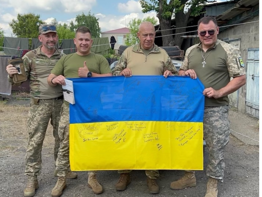 State Senator Tom Brewer, third from left, said that few Americans visit the front, so when Ukrainian soldiers see one, they are eager to embrace and thank Americans for their aid in fighting the war. (Courtesy of Noah Philson)