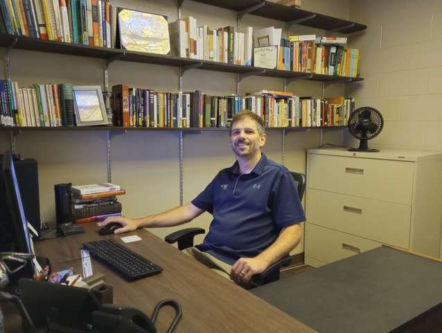 Justin Brown, Barton Community College English instructor, volunteered his time to teach a course at Juvenile Services’ Life Skills Academy. More volunteers are needed.