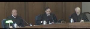 Judges sitting on the 9th U.S. Circuit Court of Appeal listen to arguments Tuesday in Jeff Fortenberry’s appeal of his three felony convictions. The judges, in a courtroom in Pasadena, California, are, from left: James Donato, Gabriel Sanchez and Salvador Mendoza, Jr. (Screenshot from 9th Circuit Court of Appeals video feed)