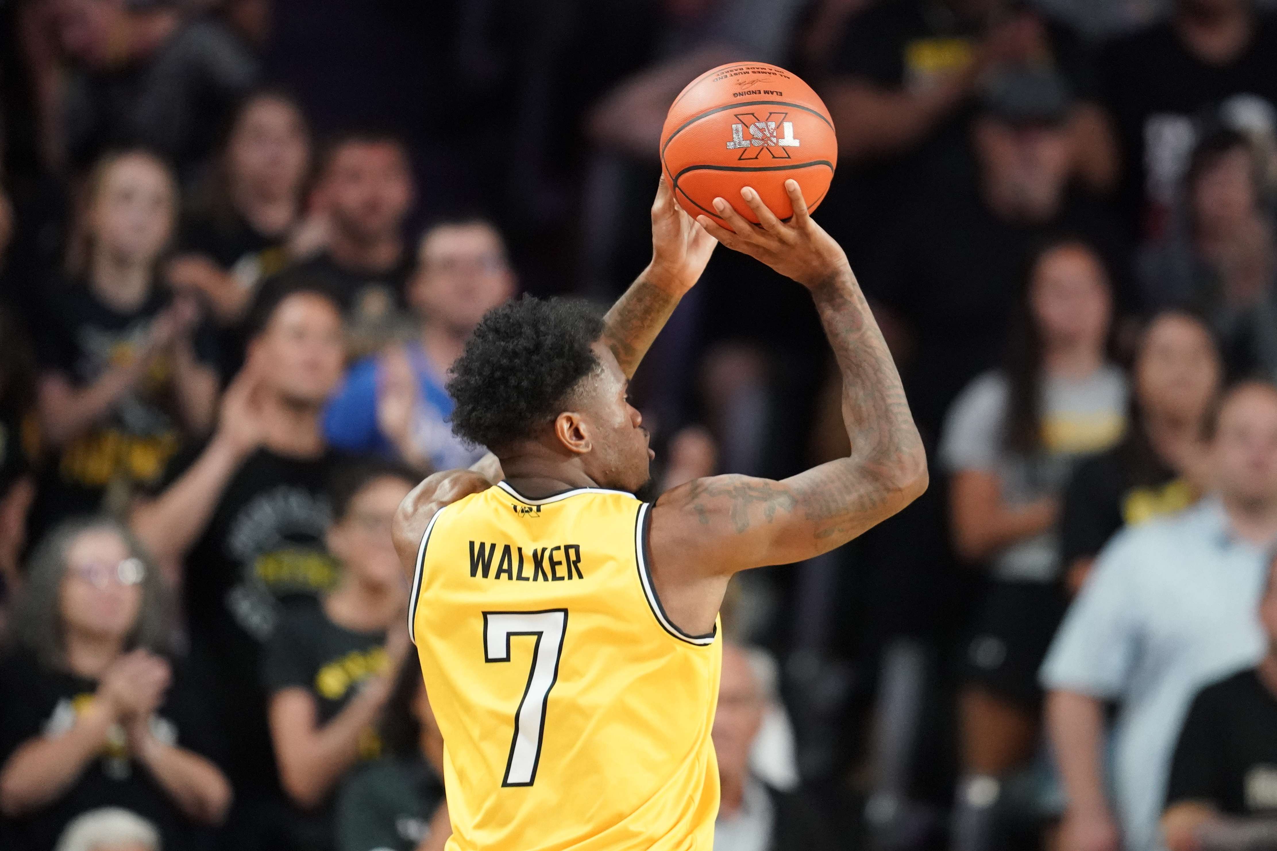 Former Hutch Salthawk Caleb Walker led the AfterShocks with 14 points.