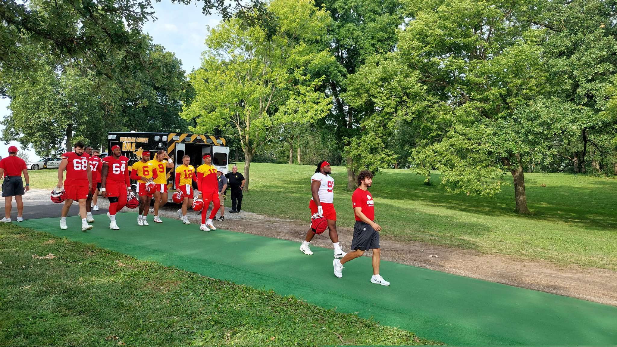 Chiefs quarterbacks alongside offensive lineman Wanya Morris and Anderson Hardy walk into practice/ Photo by Matt Pike