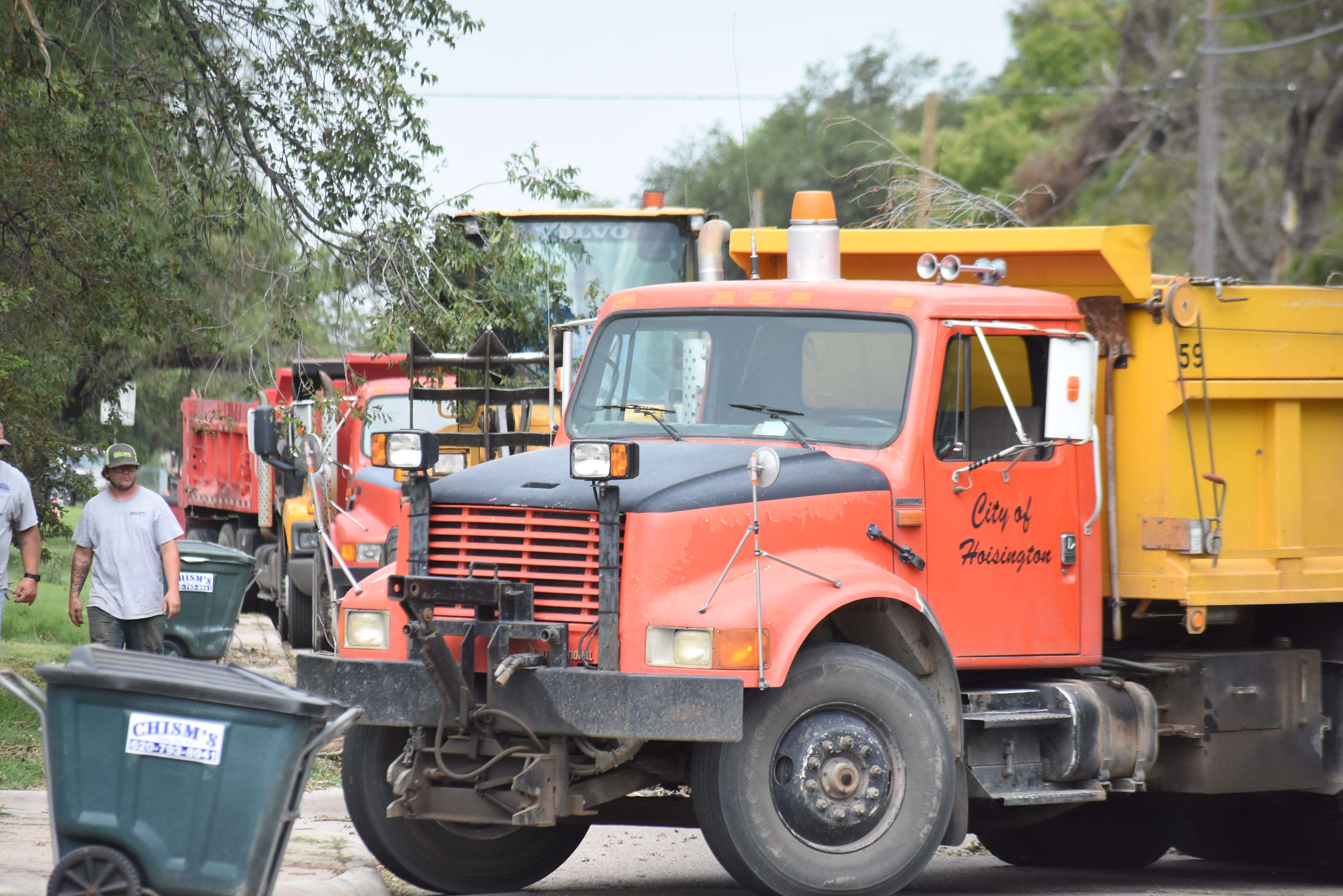 Crews from the cities of Great Bend and Hoisington clean up in the 2700 block of 19th Street last Thursday.&nbsp;