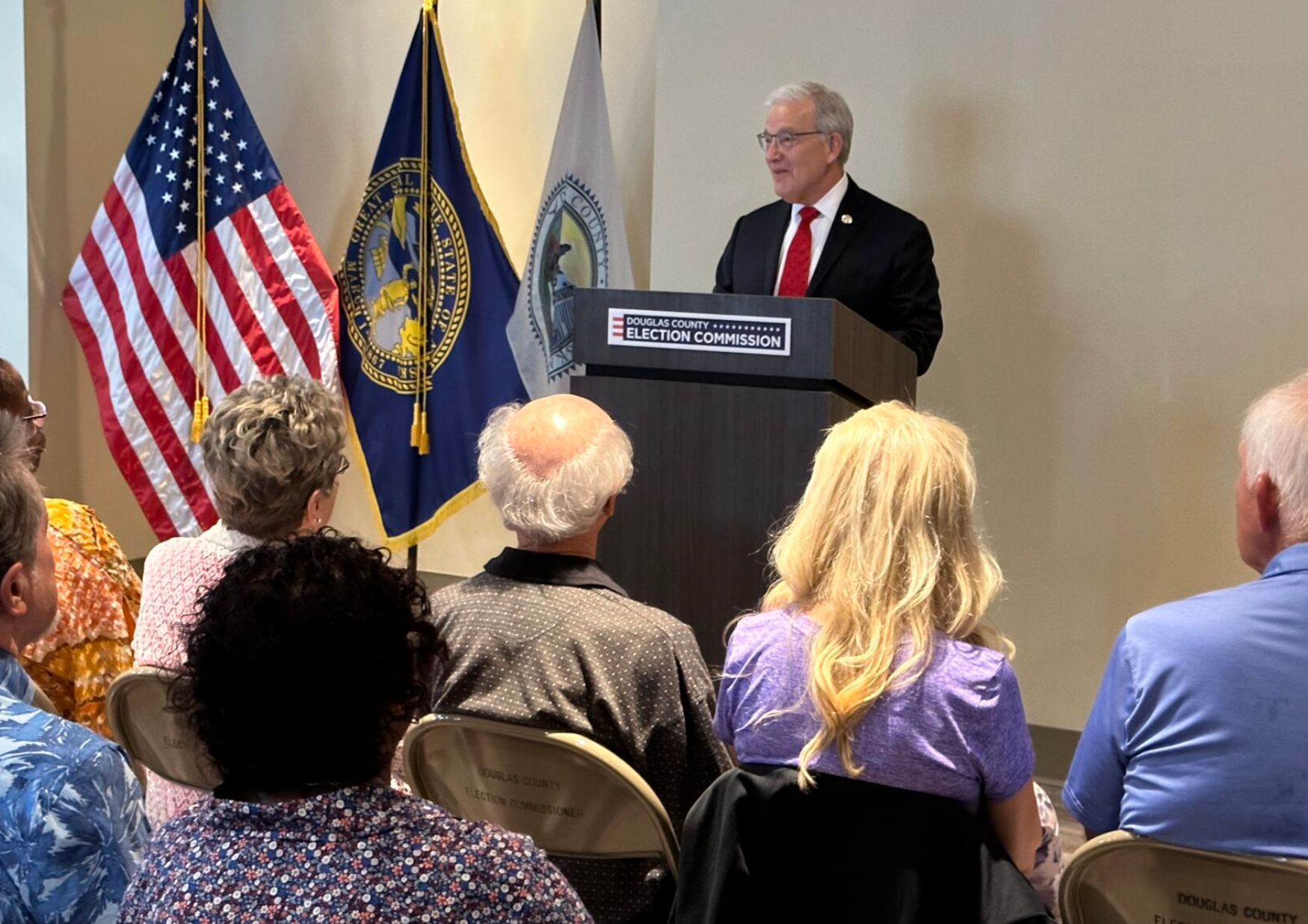 Nebraska Secretary of State Bob Evnen thanks poll workers who have achieved 20-plus years of service Wednesday in Omaha. The state is working to recruit poll workers. (Aaron Sanderford/Nebraska Examiner)