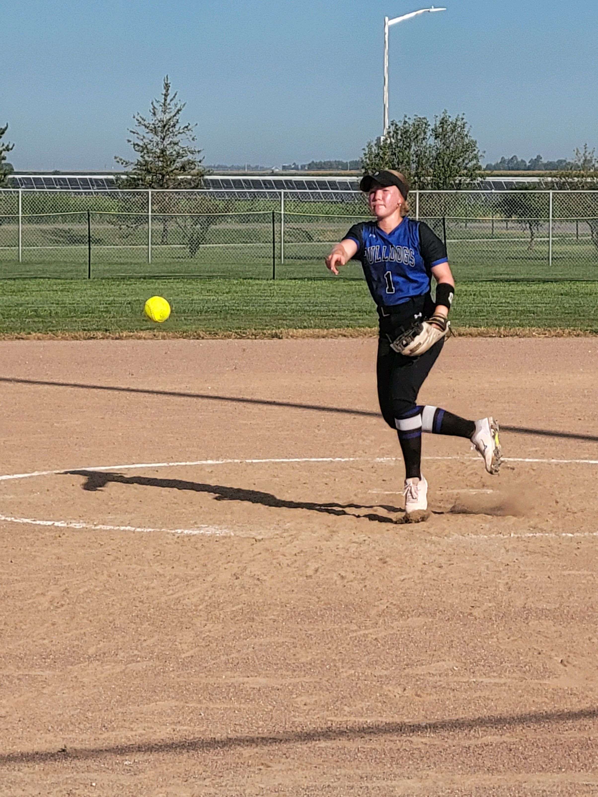 Hallie Schneider throws a pitch in a game this season