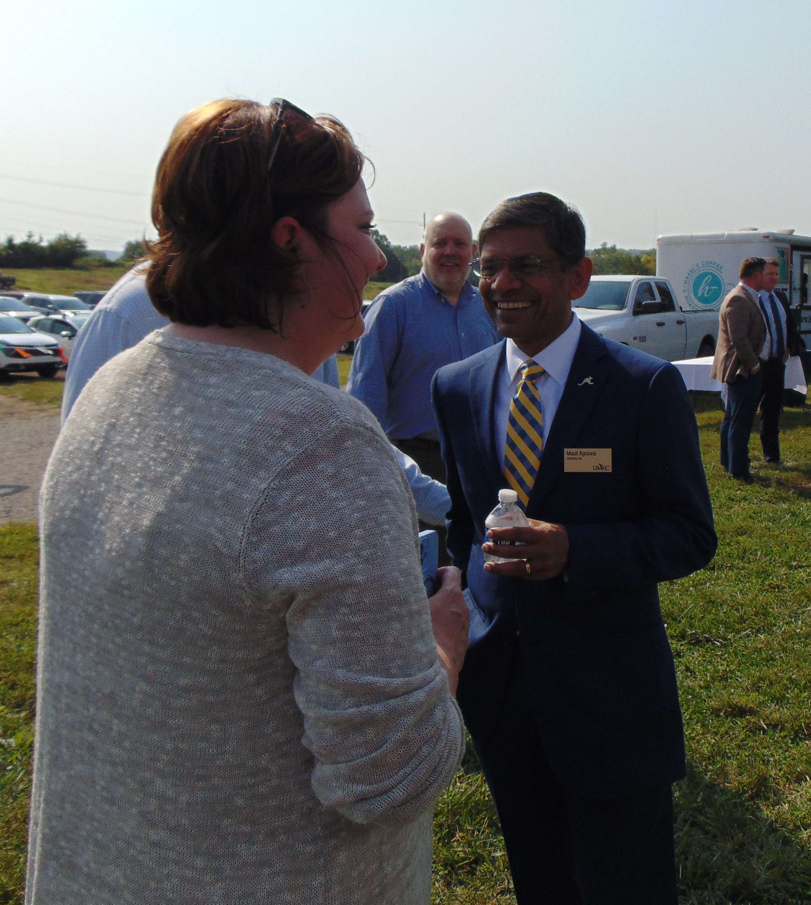 UMKC Chancellor Maul Agrawal talks with those attending the groundbreaking/Photo by Brent Martin