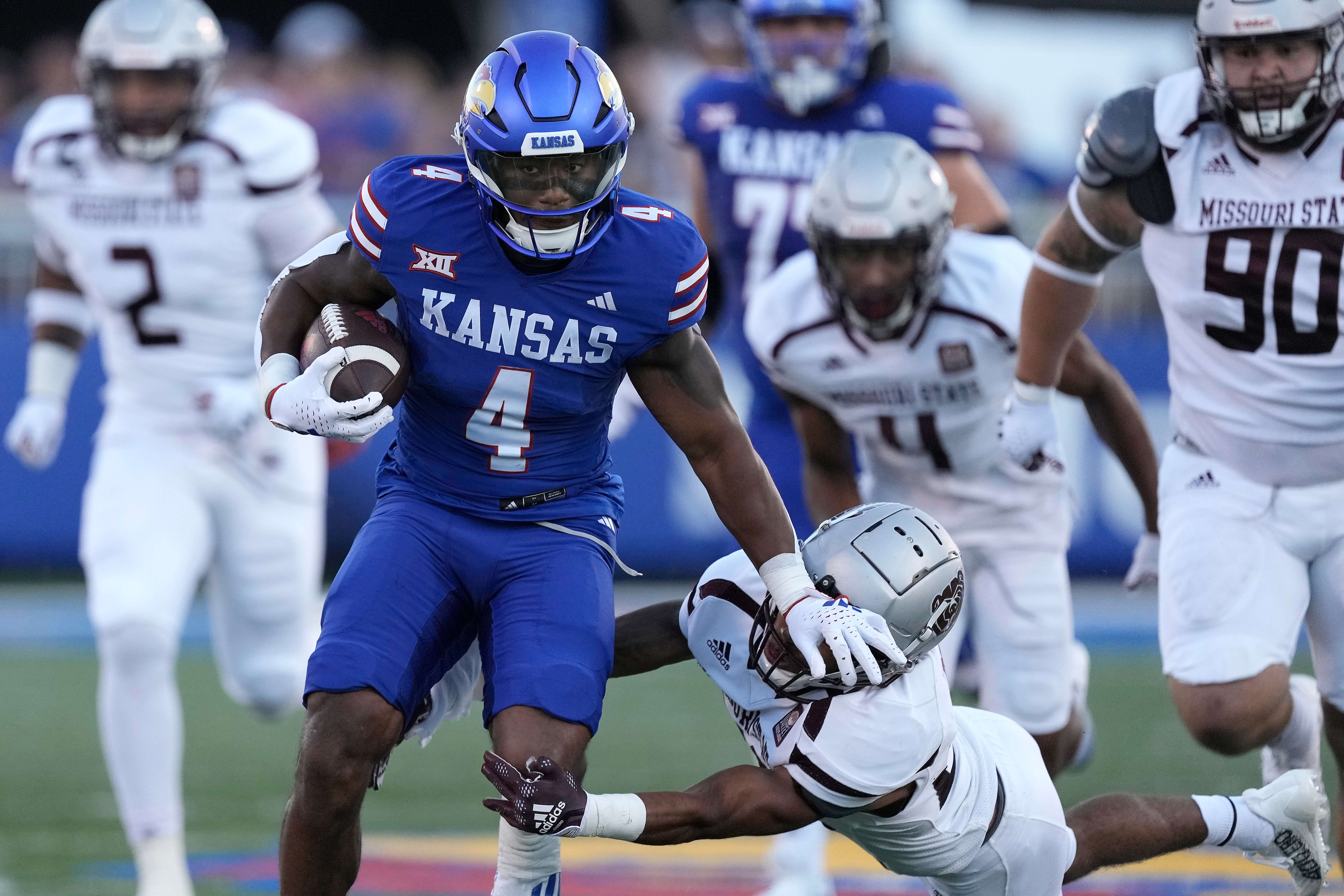 Kansas running back Devin Neal runs for a touchdown during the first half of an NCAA college football game against Missouri State Friday, Sept. 1, 2023, in Lawrence, Kan. (AP Photo/Charlie Riedel)