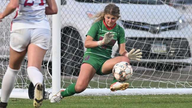 Blue Dragon goalkeeper Karsyn Slothower makes one of her seven saves in a 1-1 draw with Butler on Wednesday at the Salthawk Sports Complex. (Andrew Carpenter/Blue Dragon Sports Information).