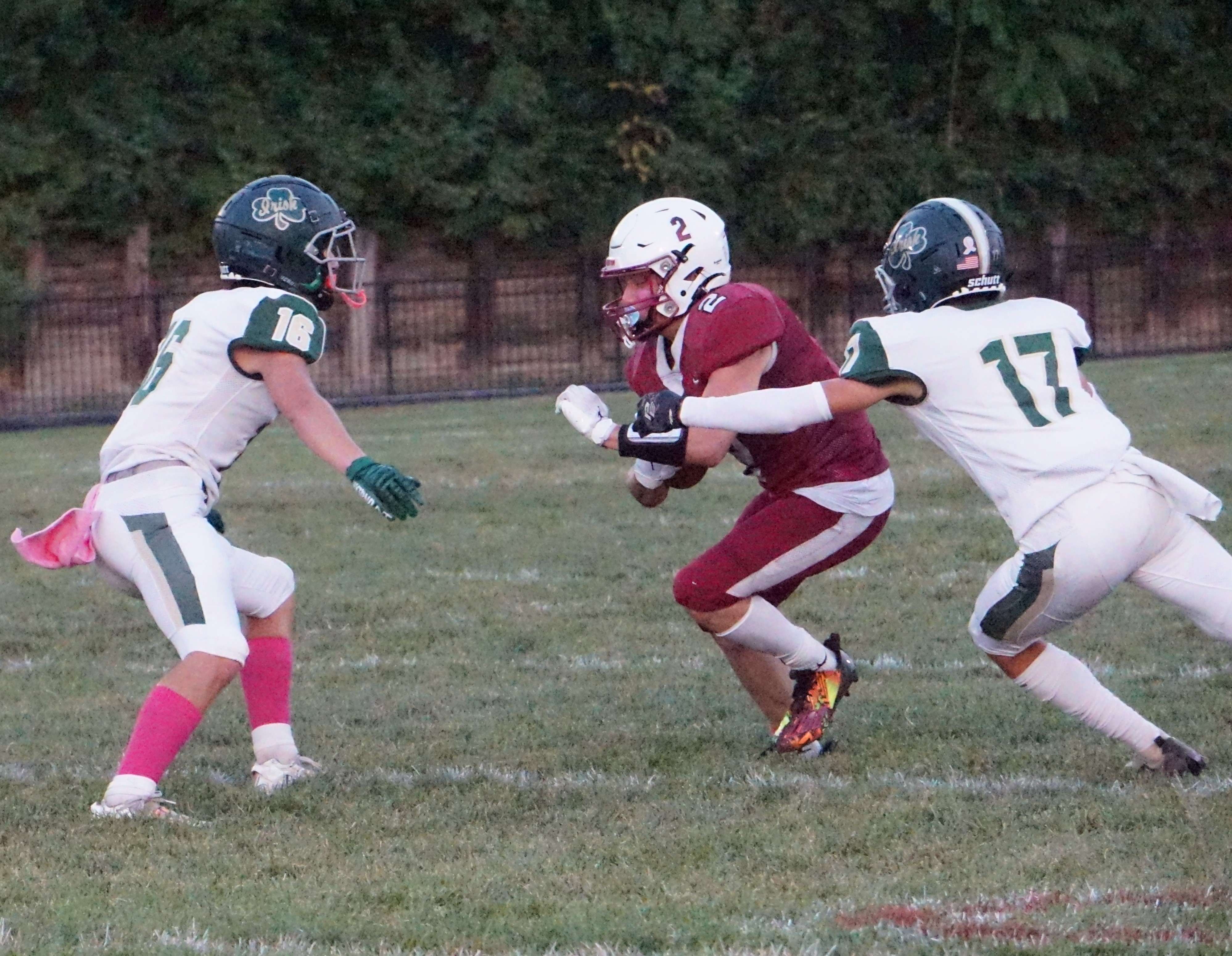 Blakely Eaton (2) is stopped by Lafayette's Jake Danner (16) and Ayden Hardy (17).