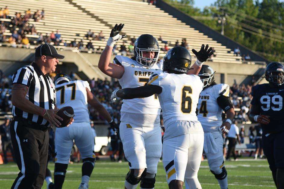 Offensive lineman Brenden McClure celebrates with running back Jered Scott.&nbsp; The Western rushing game tallied four touchdowns and 260 yards on the day/ Photo courtesy of Missouri Western Media Relations.