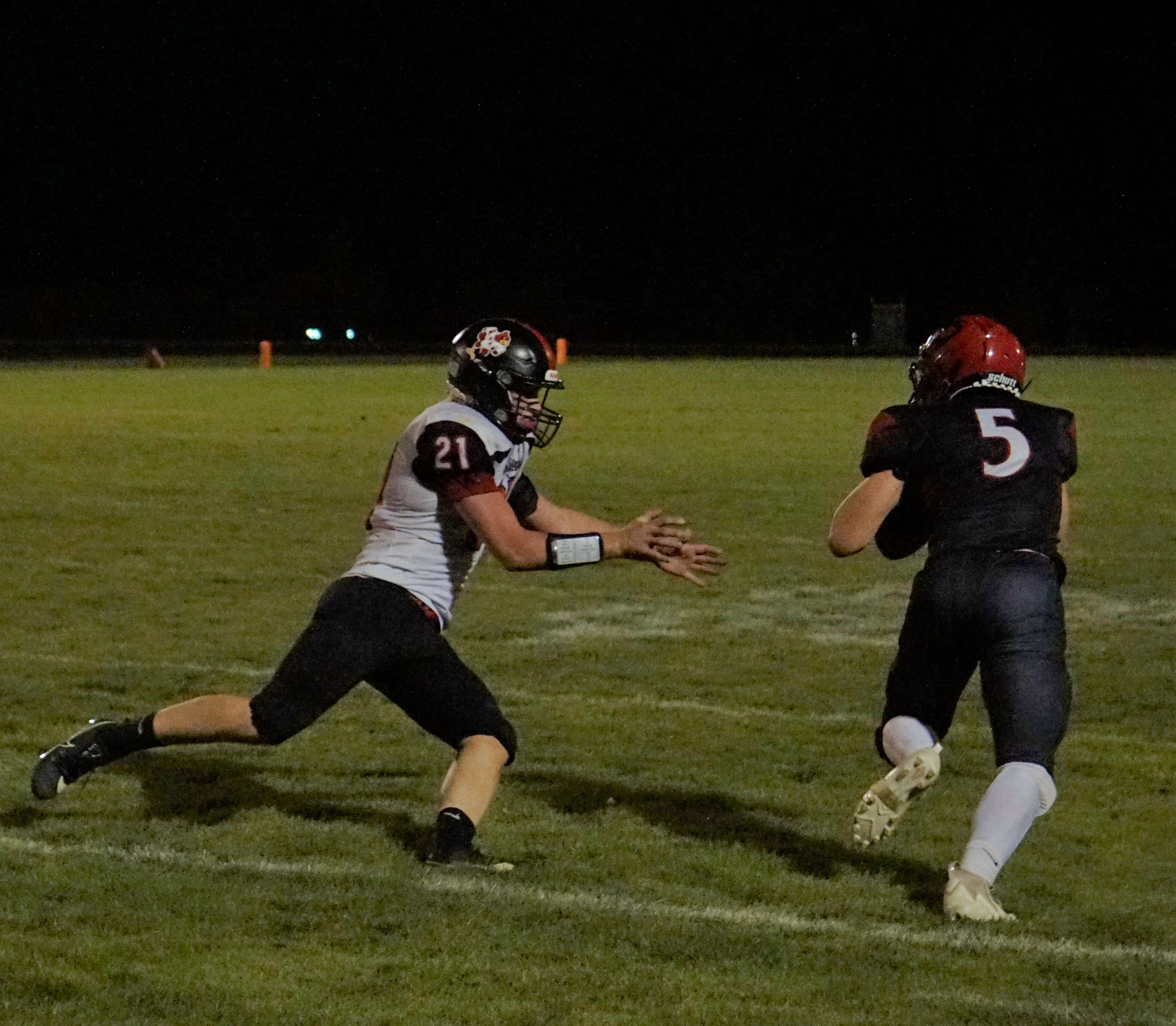 Levi Miller (5) gets chased by Avery Miller (21).