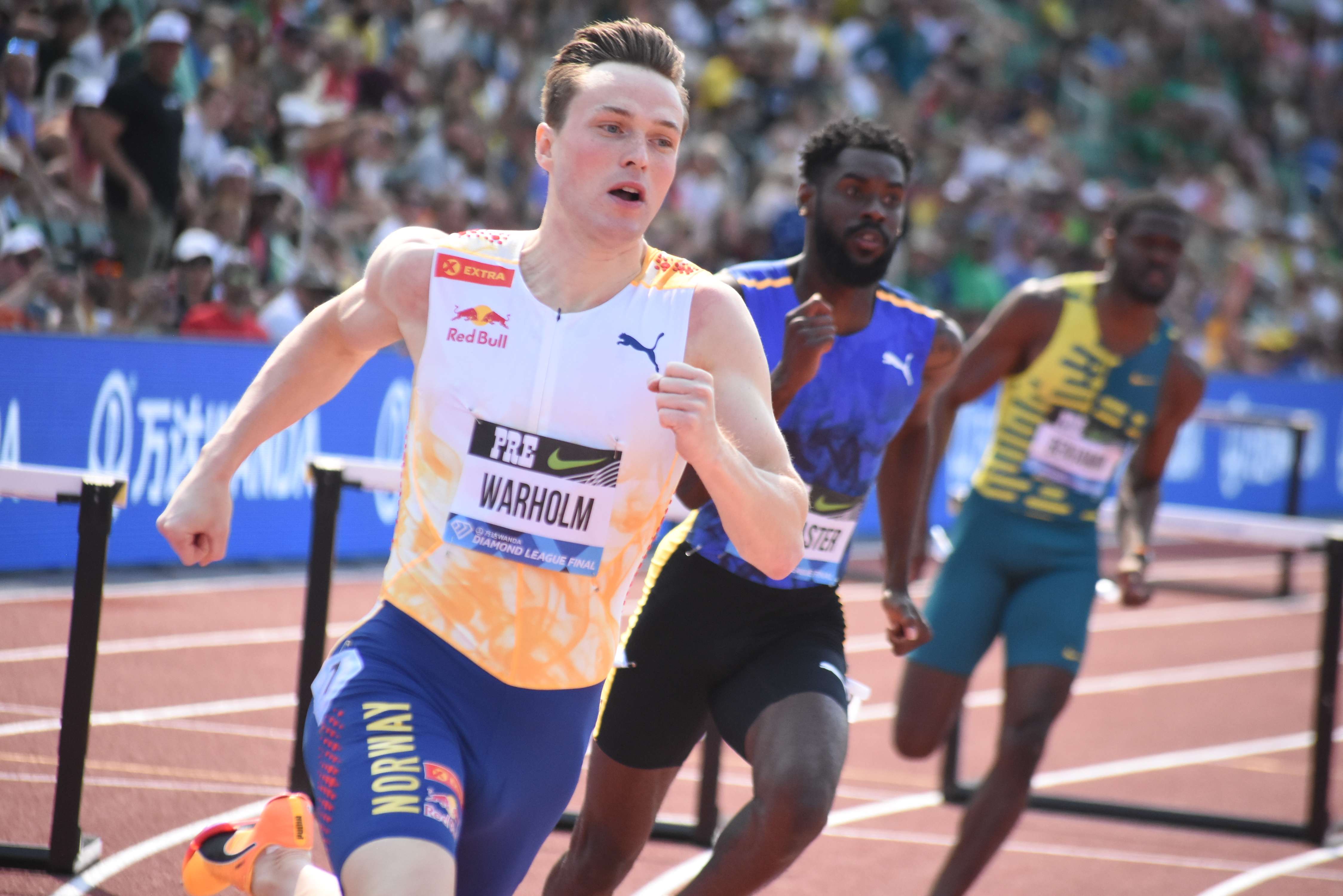 Norway's Karsten Warholm owns the world record in the 400m hurdles but settled for second place behind America's Rai Benjamin in Saturday's Diamond League finals.