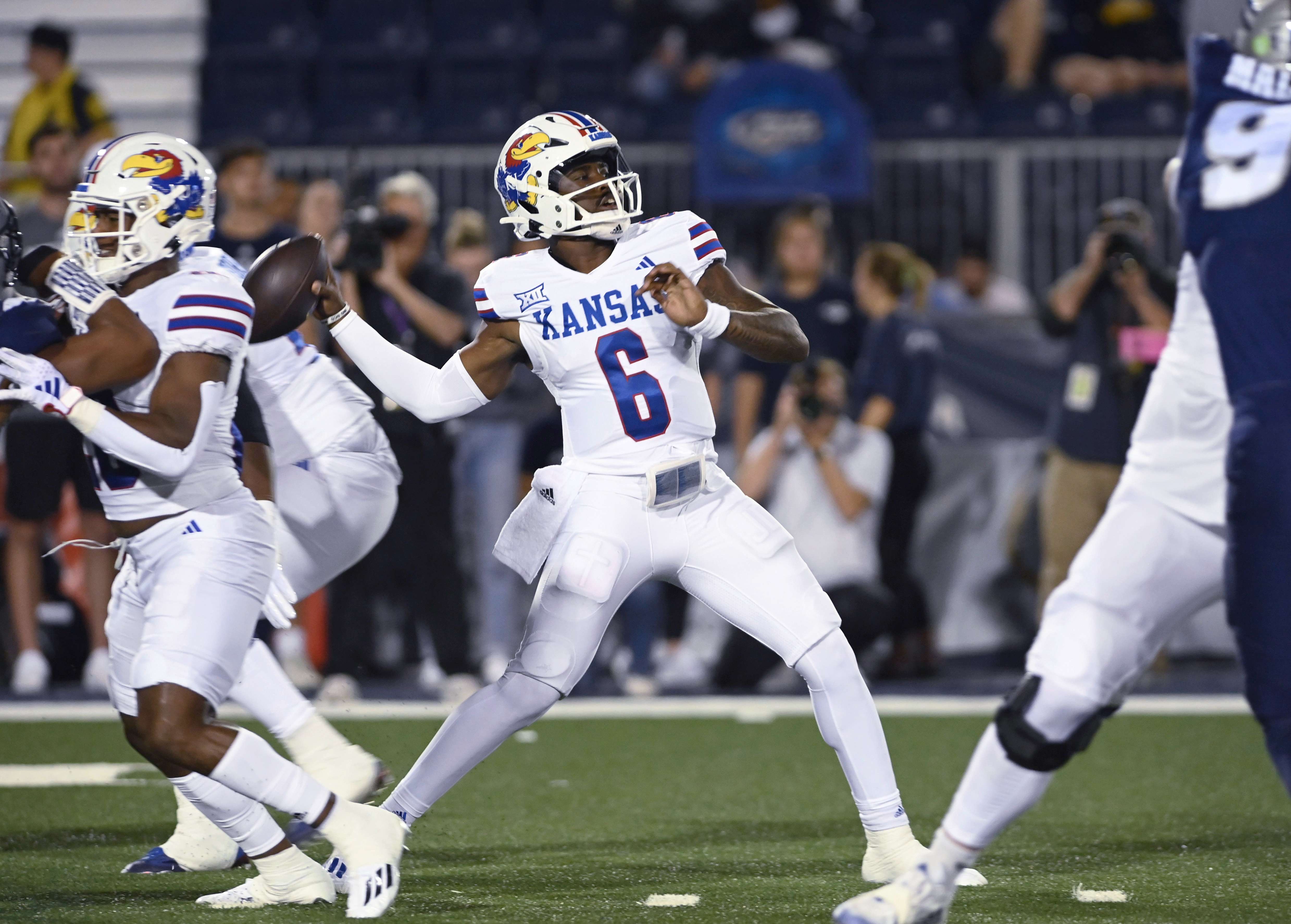 Kansas quarterback Jalon Daniels throw a pass against Nevada during the first half of an NCAA college football game Saturday, Sept. 16, 2023, in Reno Nev. (AP Photo/Andy Barron)