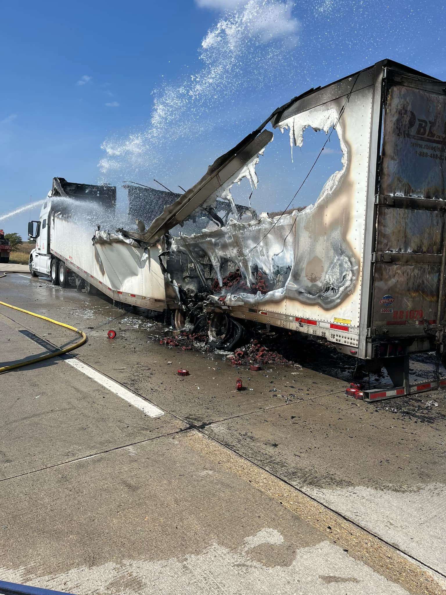 A semi-truck caught on fire on Wednesday afternoon - the back tires of the truck caught fire and burned the trailer as seen in the picture. This photo courtesy of the Geary County Emergency Management Facebook Page.&nbsp;