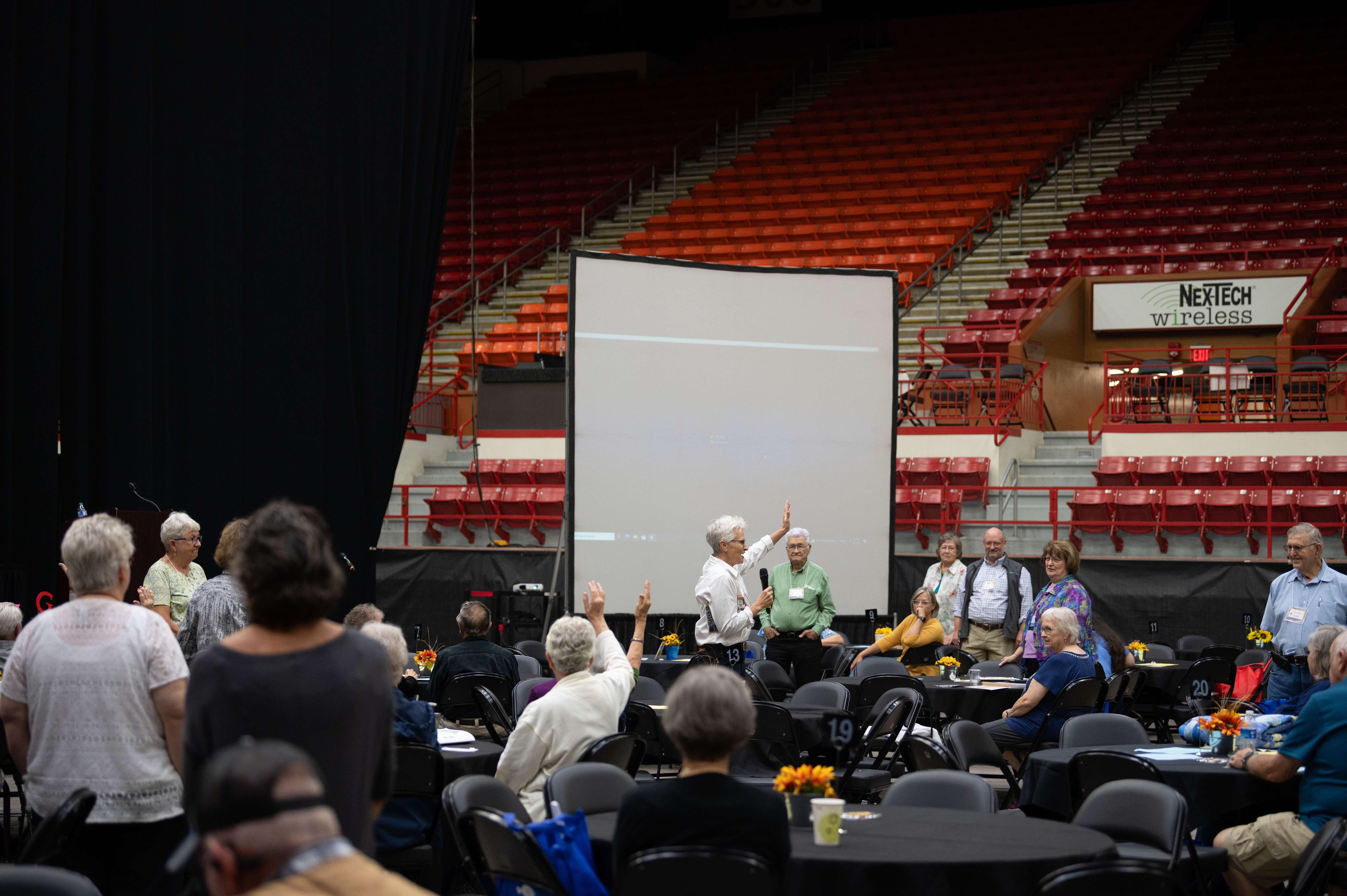 Marci Penner, executive director of the Kansas Sampler Foundation and author of "The Kansas Guidebook" speaks to the Sunflower Fair audience on Tuesday, Sept. 19 at the Tony's Pizza Event Center. Photo by Olivia Bergmeier