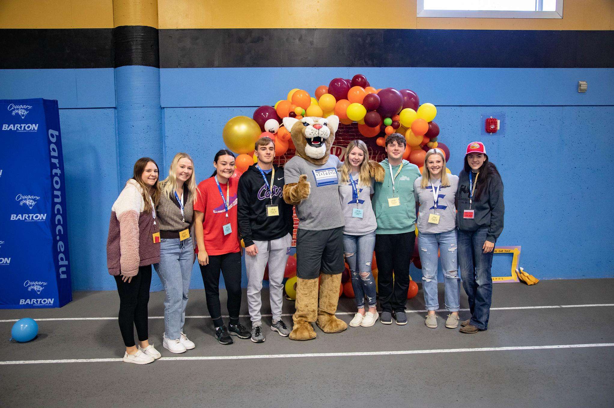 A group of students pose for a photo with Barton’s mascot at Senior Day last fall. Students can win free Barton items throughout the day, as well as win scholarships, raffle prizes and learn about various aspects of the college.