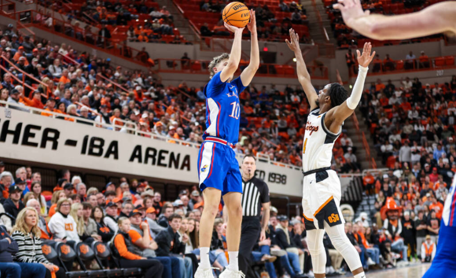Kansas guard Johnny Furphy (10) shoots a three-pointer during the first half of an NCAA college basketball game against Oklahoma State on Tuesday, January 16, 2024 in Stillwater, Okla. (Kansas Athletics photo)