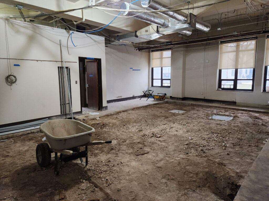 Parts of the flooring in the commission room collapsed once the flooring was removed. The issues have been corrected and trenches were created for electric cables.