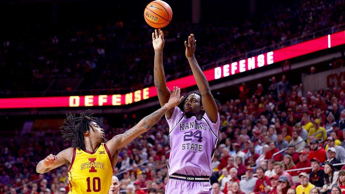Kansas State's Arthur Kaluma attempts a shot over Iowa State's Keshon Gilbert, during the first half of an NCAA college basketball game on Wednesday, January 24, 2024 in Ames, Iowa (Kansas State athletics photo)