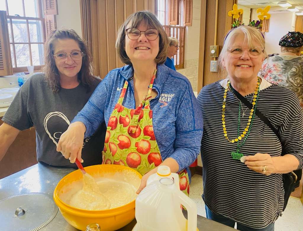 Cynthia Vandermeer, Karen Kline-Martin and Leslie Mingenback prepare last year's Shrove Tuesday supper.