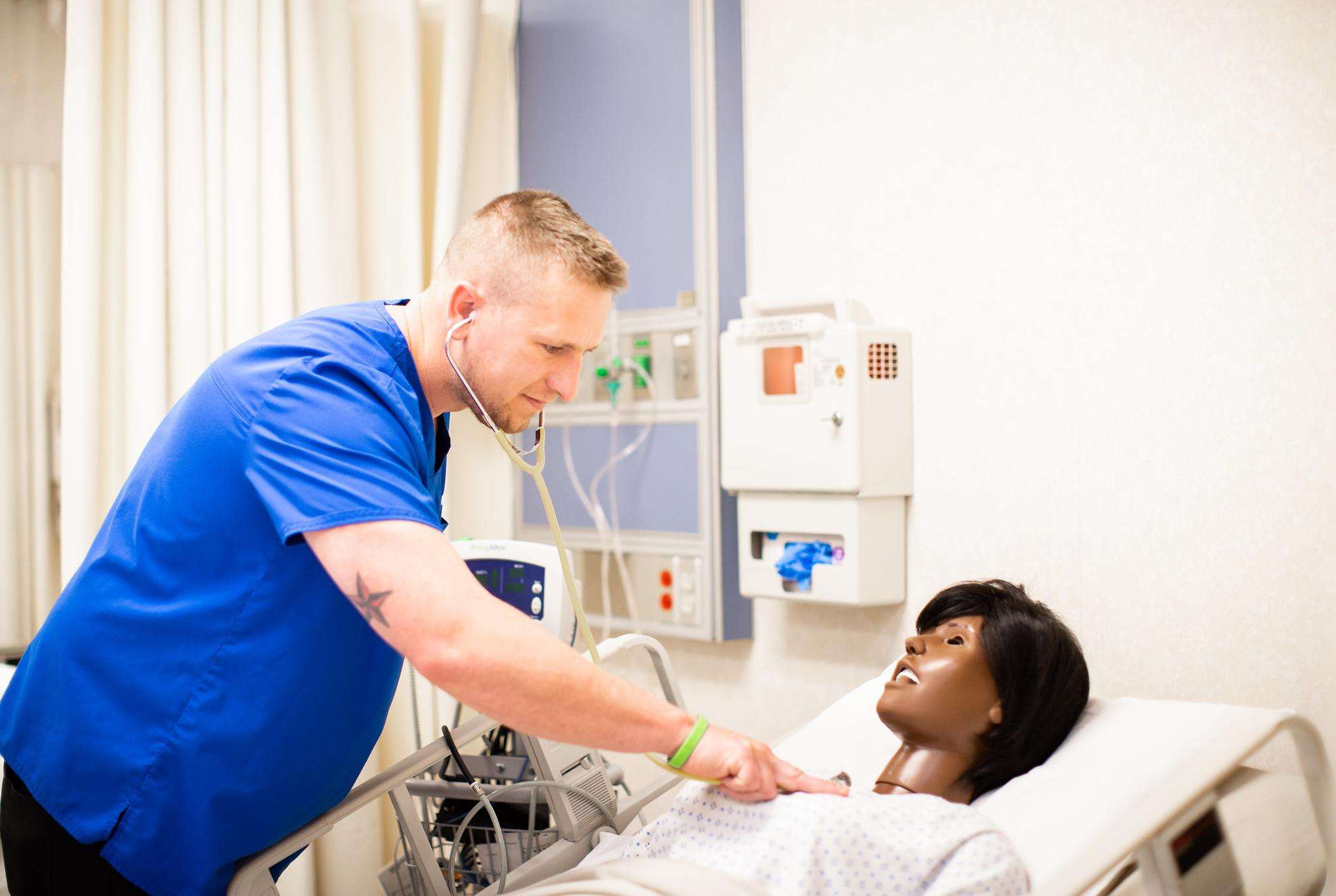 A Barton Nursing student at the Pratt Community College location practices skills in Chandler Hall during a past classroom session.