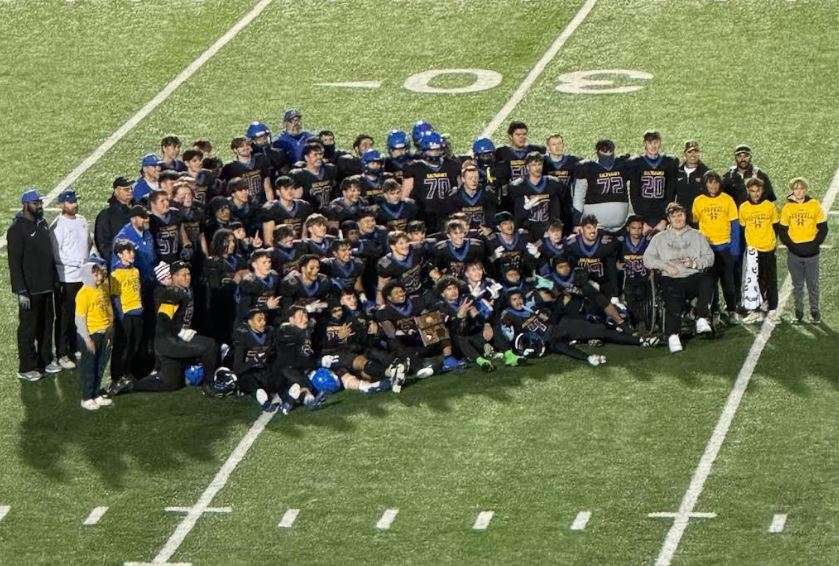 The Hutch High Salthawk football team takes a team photo following a 33-13 win over Liberal in the Class 5A playoffs Thursday night at Gowans Stadium. Photo by Dan Naccarato.