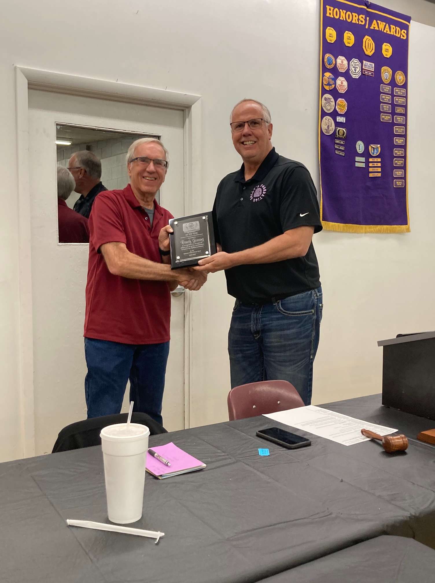 At the November meeting, the Great Bend Optimist Club handed out the "Optimist of the Year" award for the 2023-2024 year. Outgoing president Randy Goering received the award. President John Sullivan handed Goering the award.