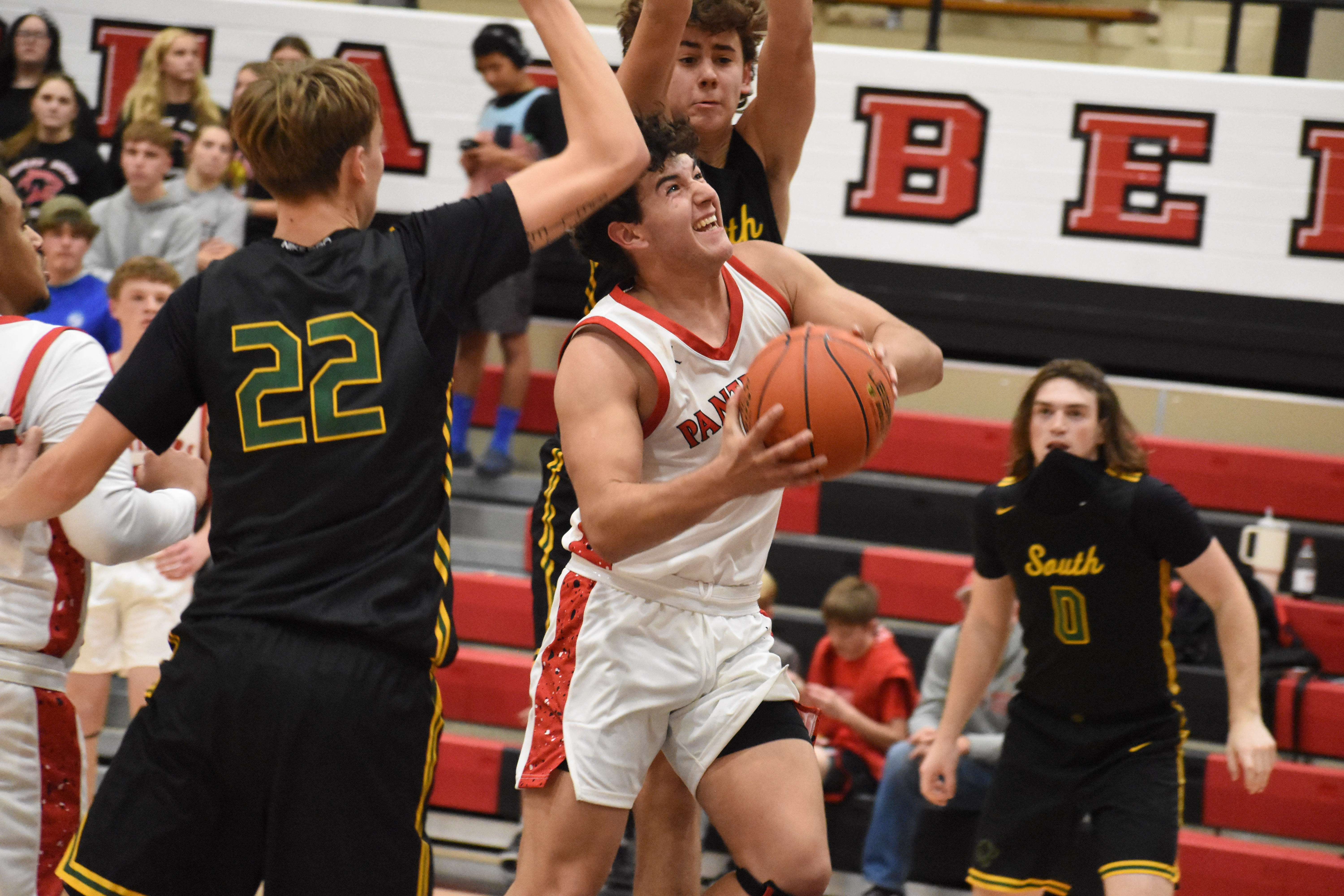 Panther junior Jacob Hall goes up for two of his 13 points in Friday's 71-44 win against Salina South.