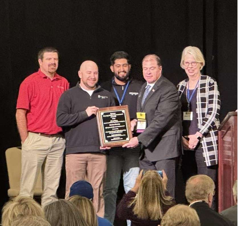 Barton County Emergency Management Director Sean Kelly accepts an award on behalf of the county during last week's Kansas Association of Counties Annual Conference in Topeka.