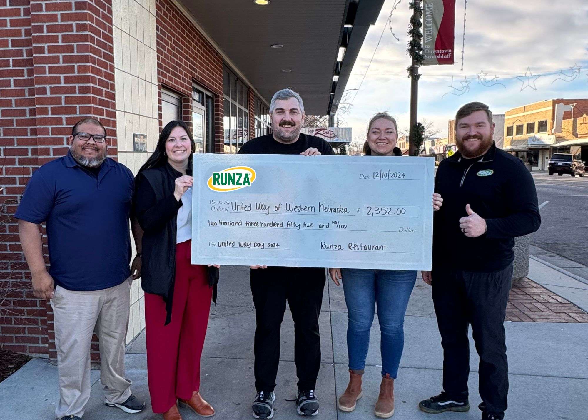 In the picture (L-R) is Jessie Lopez (United Way Campaign &amp; Community Impact Coordinator), Karen Benzel (United Way Executive Director), Spencer Blomenkamp (Runza), Brooke Samuelson (Runza) and Tanner Blomenkamp (Runza).