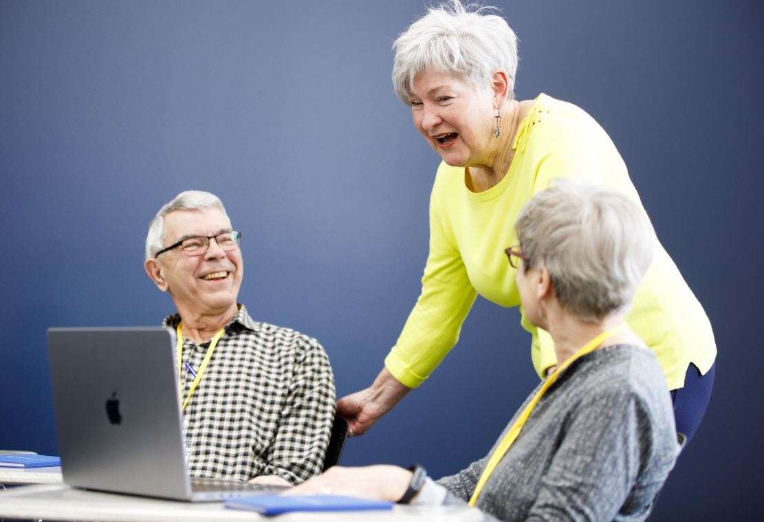 Retired professor Raylene Hinz-Penner talks with participants in a spring 2023 Bluestem U course. Registration is now open for a new expanded lineup of classes beginning in January. Photo by Gavin Peters Photography.