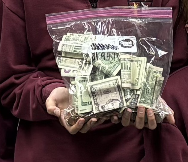 Paper or coins, the $194 donated by St. Joseph students will go toward the purchase of sleeping bags for those in need.