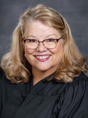 Judge Patricia Macke Dick