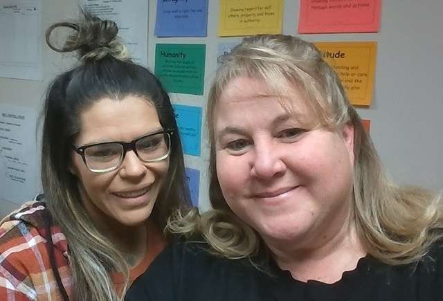 Anecia Beaman, left, collaborates with Casey Rowland who leads Parent Project classes at Juvenile Services in Great Bend. The next series of classes begins Jan. 21.