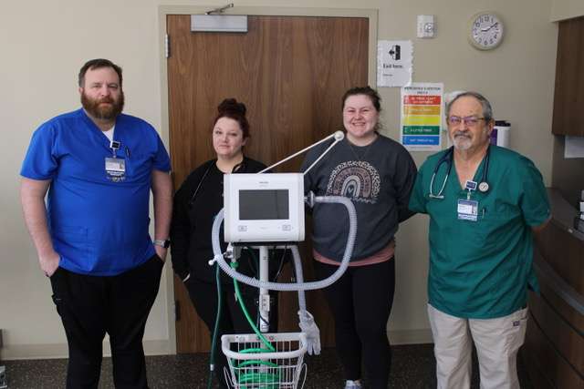 From left to right, Dusty Thacker, Chantell Richmeier, Mackenzie Macmahon and Wayne Wilcox display one of the new ventilators at Pawnee Valley Community Hospital.