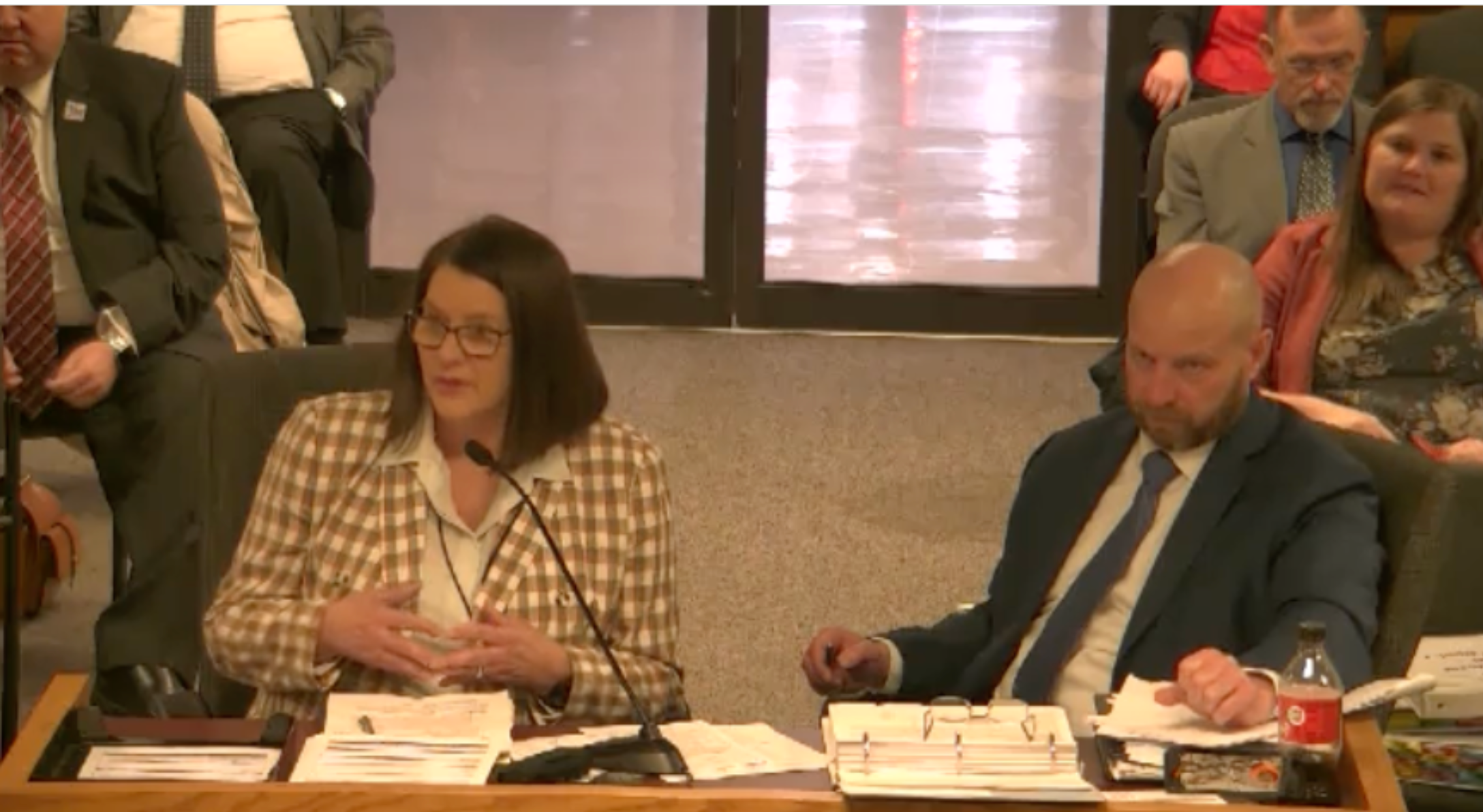  Kim Evans, director of Family Support Division, and Patrick Luebbering, chief financial officer, of the Department of Social Services at a December 2023 budget hearing (screenshot).