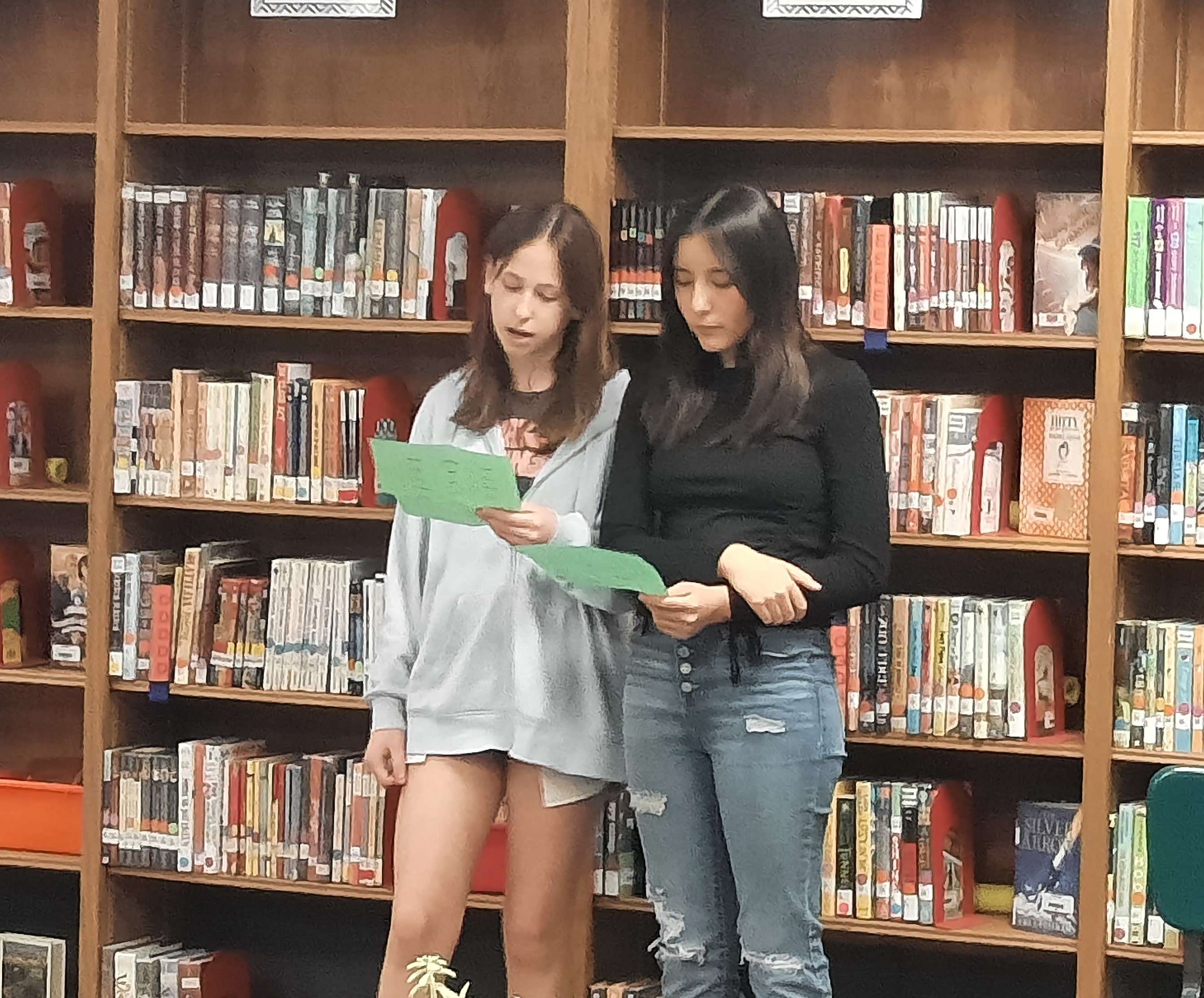 Park Elementary sixth graders Gentry VanSkike and Rubi Perez present before the USD 428 Board of Education Tuesday in Great Bend.