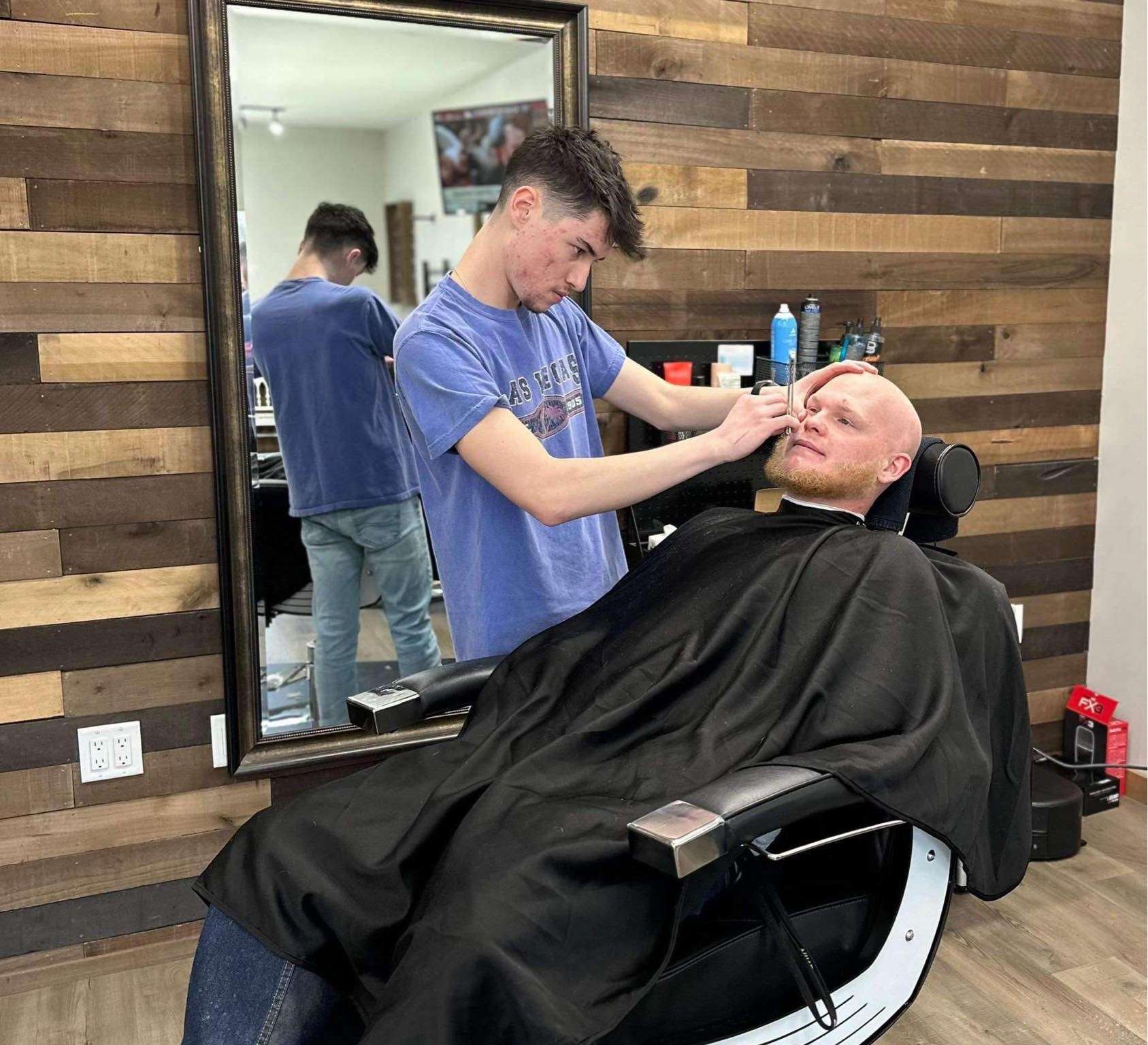 Alex Elmore, a 2022 Hoisington High School graduate, recently graduated from barber school and will be offering his services at Brick Road Salon and Boutique in Hoisington. (photo courtesy of Karen Baldyga)