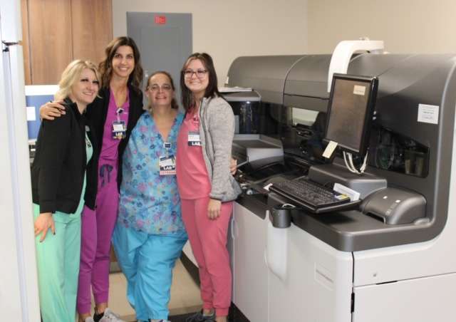 Laboratory personnel at Pawnee Valley Community Hospital display their new equipment. From left to right are: Dominique Hiss, Kristi Engle, Nishka McKenzie and Megan Grandy.