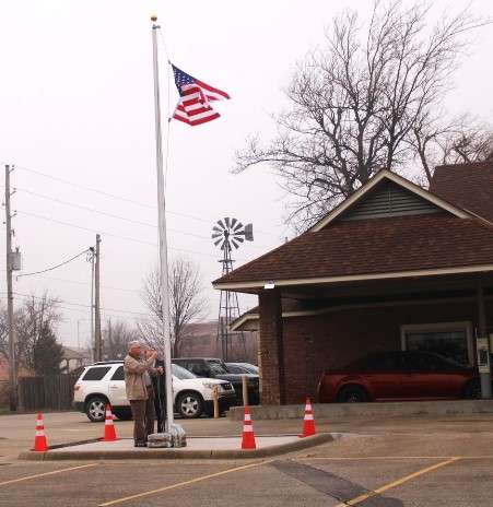 A new flagpole is located in front of HGE Credit Union at 121 E. Ave. A. The credit union hosted a flag raising ceremony on Saturday, March 2. Photo by Emmie Boese.