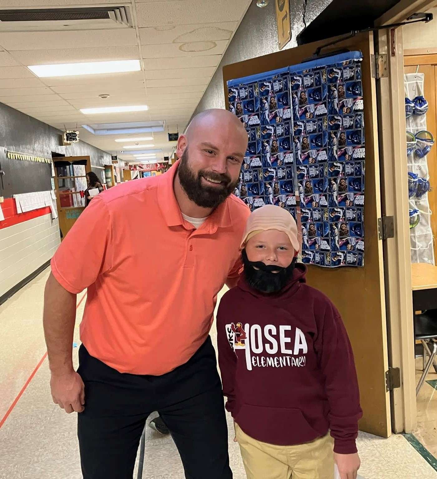 Hosea Assistant Principal Jacob Kretzer (left) with a student in a&nbsp; photo Kretzer submitted to the Missouri Association of Elementary Principals.
